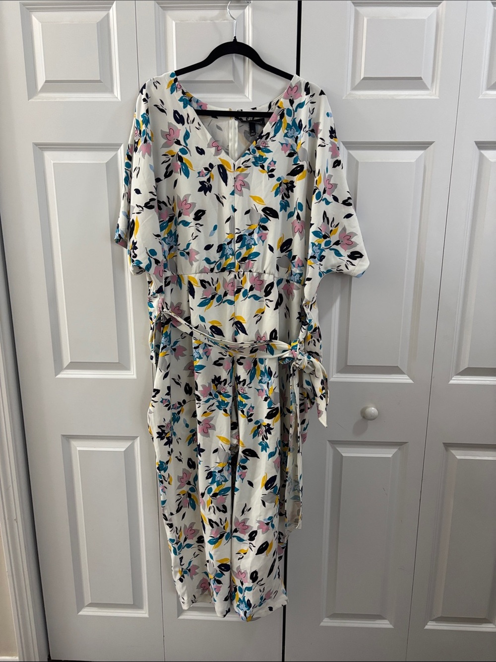 Lane Bryant White Floral V-Neck jumpsuit with Blue, Pink & Yellow Accents